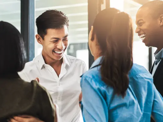 Group of diverse young professionals smiling