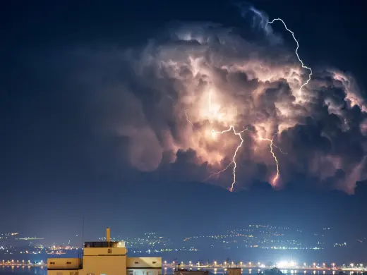 Lighting storm over metropolitan area