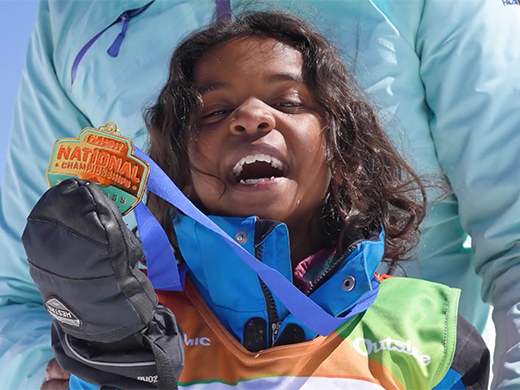 Girl with skiing medal